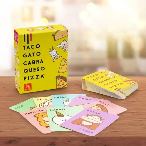Caja y cartas desplegadas de Taco Gato Cabra Queso Pizza